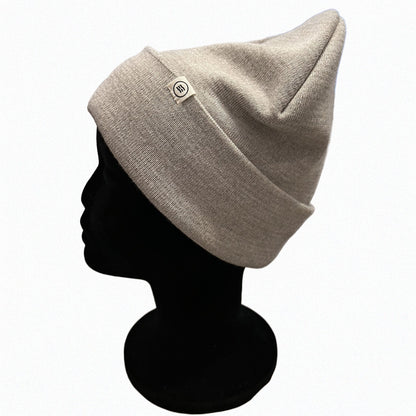 Tuque en Mérino Sand avec clip label discret