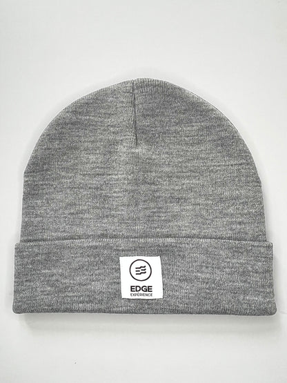 Tuque chinée grise en Polyana, présentée seule, avec texture chinée raffinée et fibres durables à faible impact environnemental.